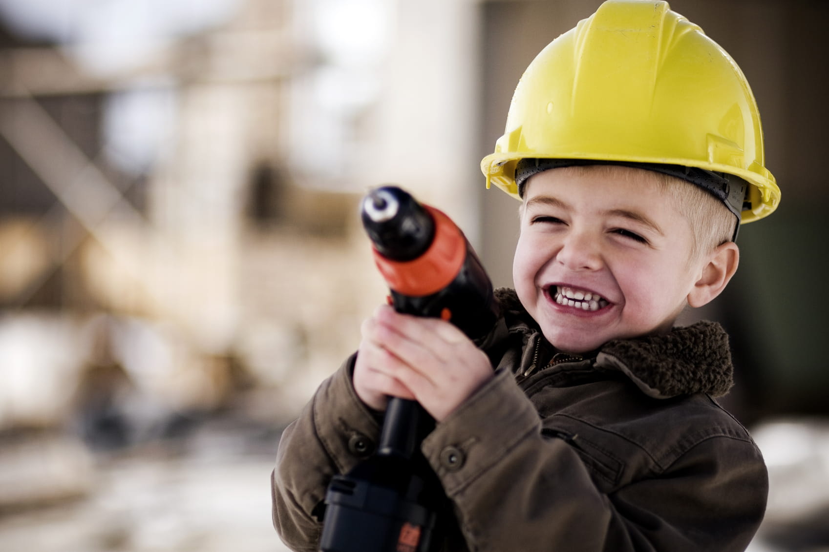 From cool yellow helmets to the bulldozer's beeps, construction sites are fantastic for building your child's understanding of the world. Photo by © Andrew Rich